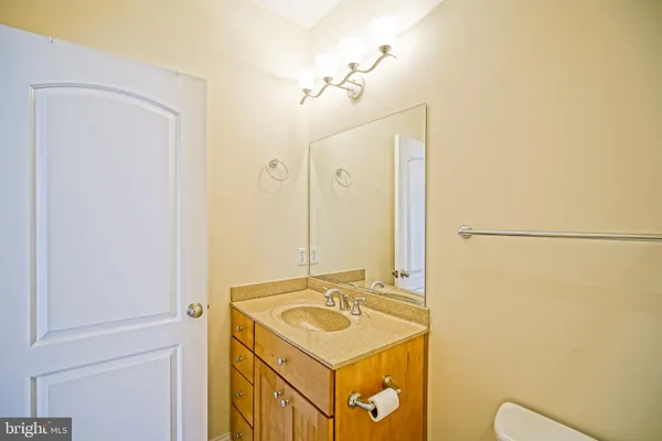 a bathroom with a shower curtain and a sink