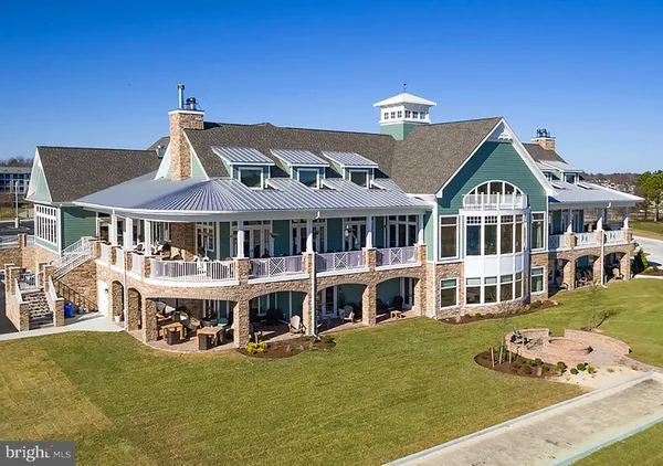 a room with lots of tables and chairs
