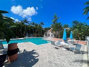 1001 Crystal Way, Unit B Delray Beach, FL 33444 - Photo 8 of 12 a view of a backyard with sitting area
