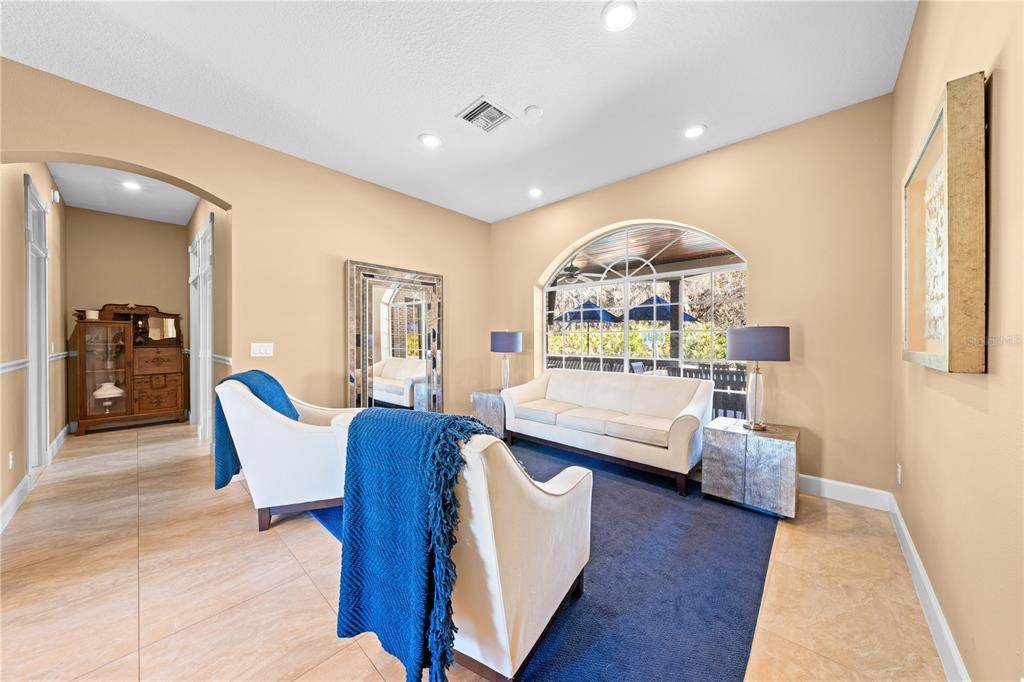 4231 Albritton Road St. Cloud, FL 34772 - Photo 14 of 94 a living room with furniture and a wooden floor