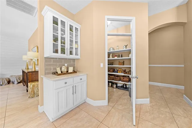 a bathroom with sink and mirror