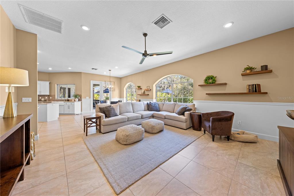 4231 Albritton Road St. Cloud, FL 34772 - Photo 31 of 94 a living room with furniture and wooden floor