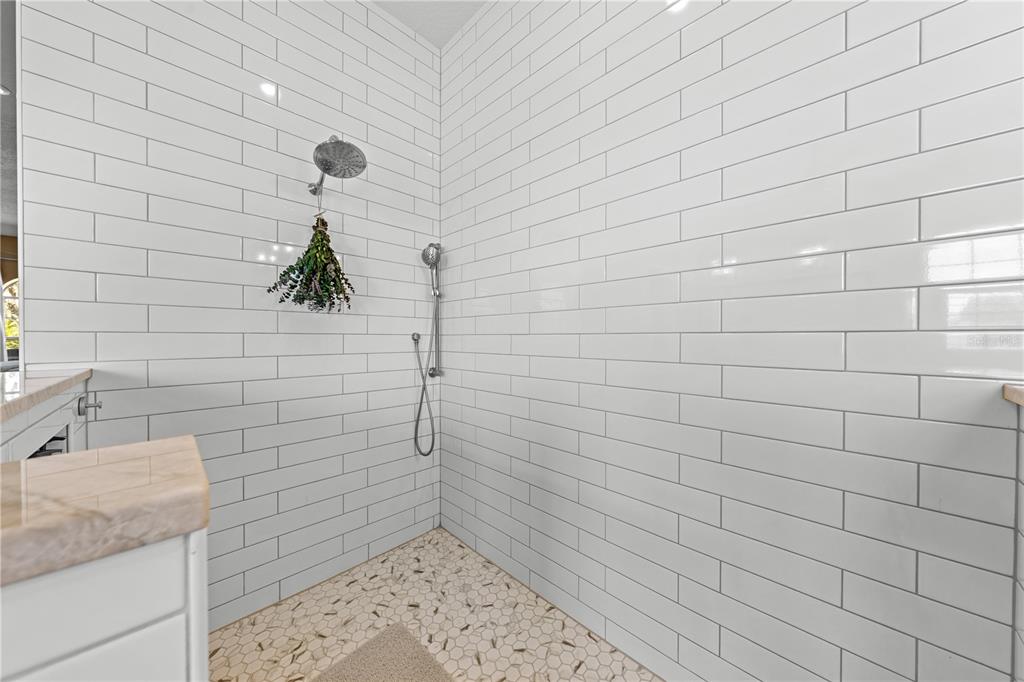4231 Albritton Road St. Cloud, FL 34772 - Photo 41 of 94 a bathroom with a shower