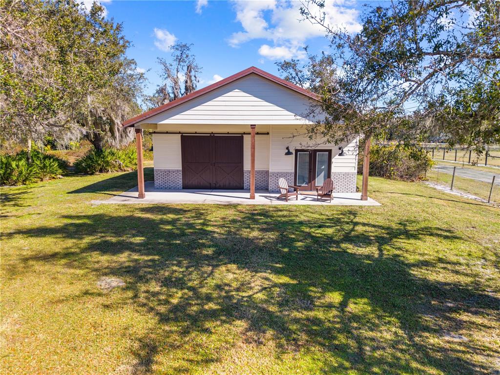 4231 Albritton Road St. Cloud, FL 34772 - Photo 68 of 94 a front view of a house with a yard