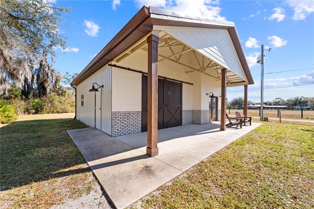 4231 Albritton Road St. Cloud, FL 34772 - Photo 69 of 94 a view of a house with backyard and sitting area