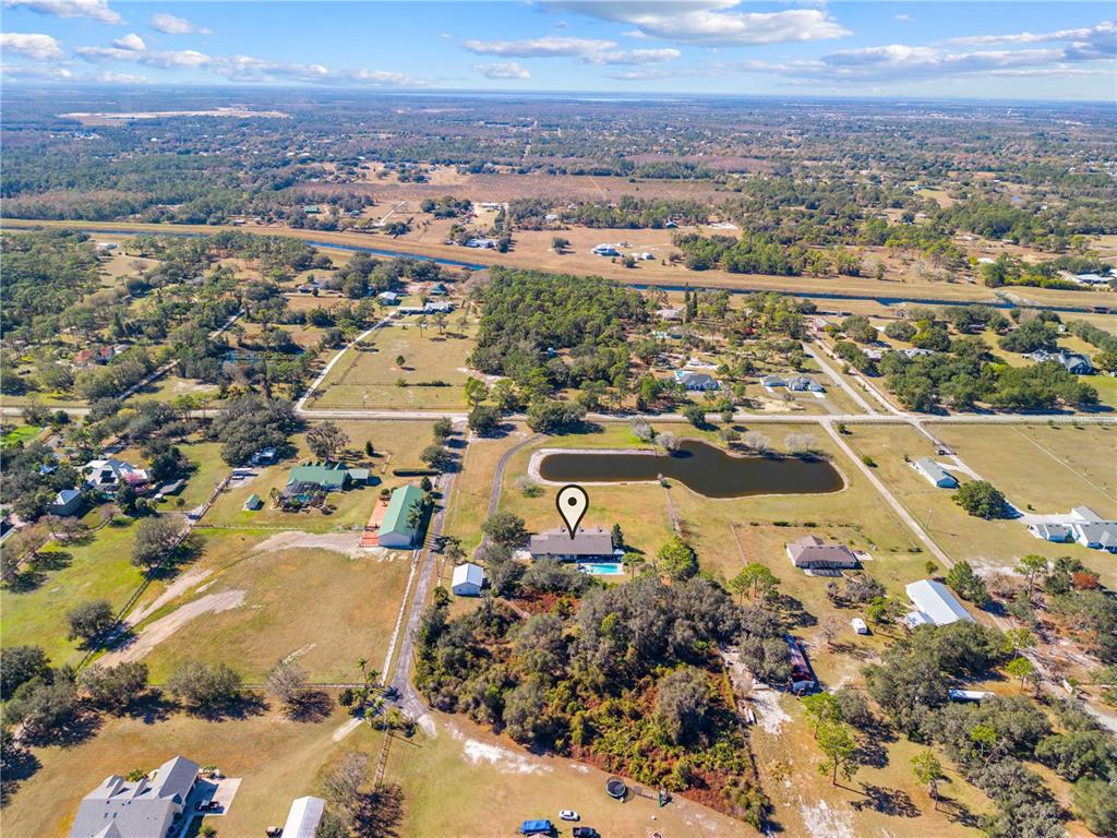 4231 Albritton Road St. Cloud, FL 34772 - Photo 86 of 94 an aerial view of residential houses with outdoor space