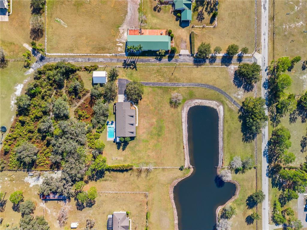 4231 Albritton Road St. Cloud, FL 34772 - Photo 9 of 94 an aerial view of a house with a yard