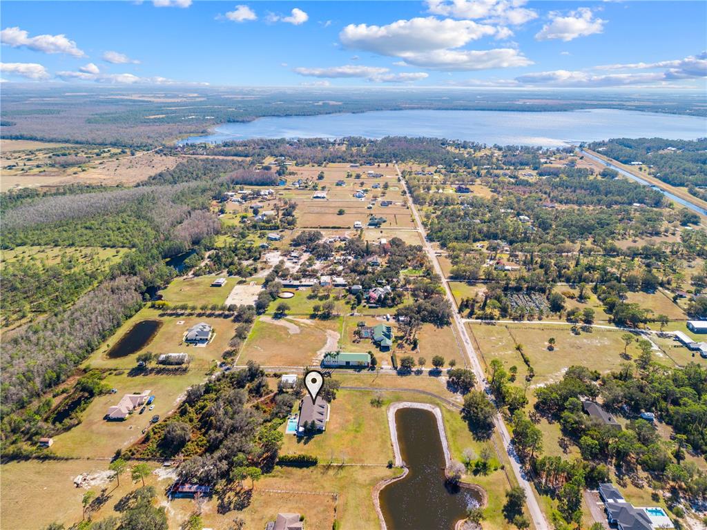 4231 Albritton Road St. Cloud, FL 34772 - Photo 93 of 94 an aerial view of residential building with parking space