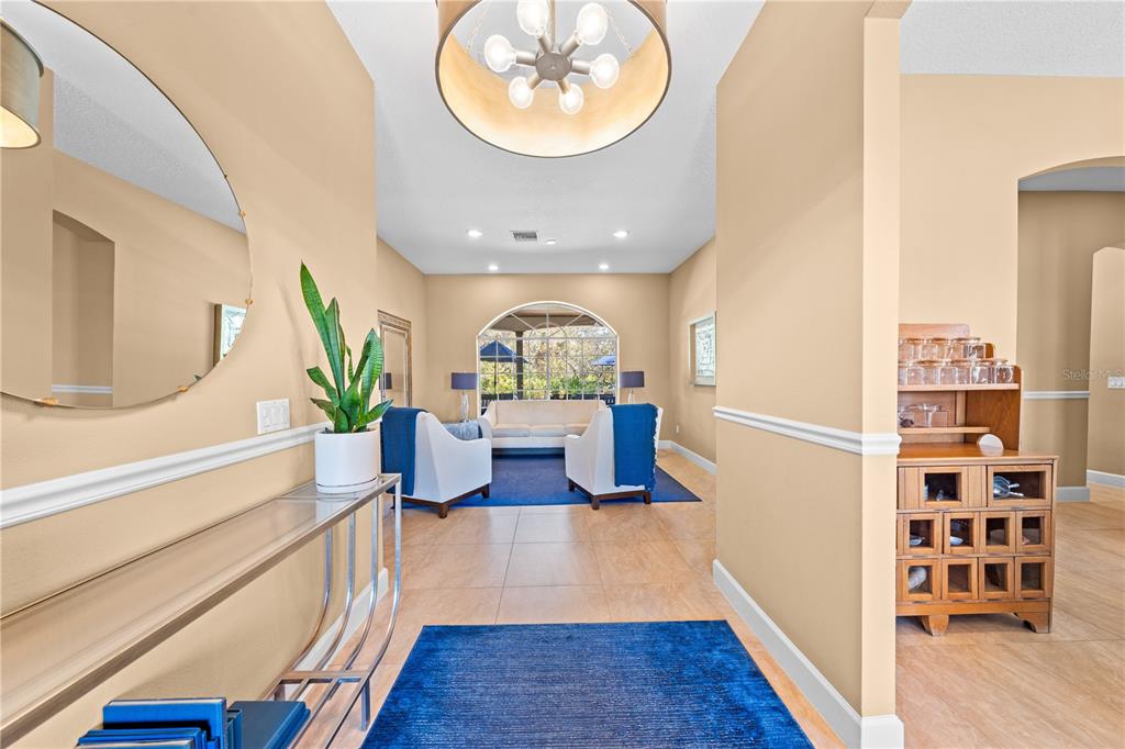 4231 Albritton Road St. Cloud, FL 34772 - Photo 10 of 94 a view of a living room and a dining room