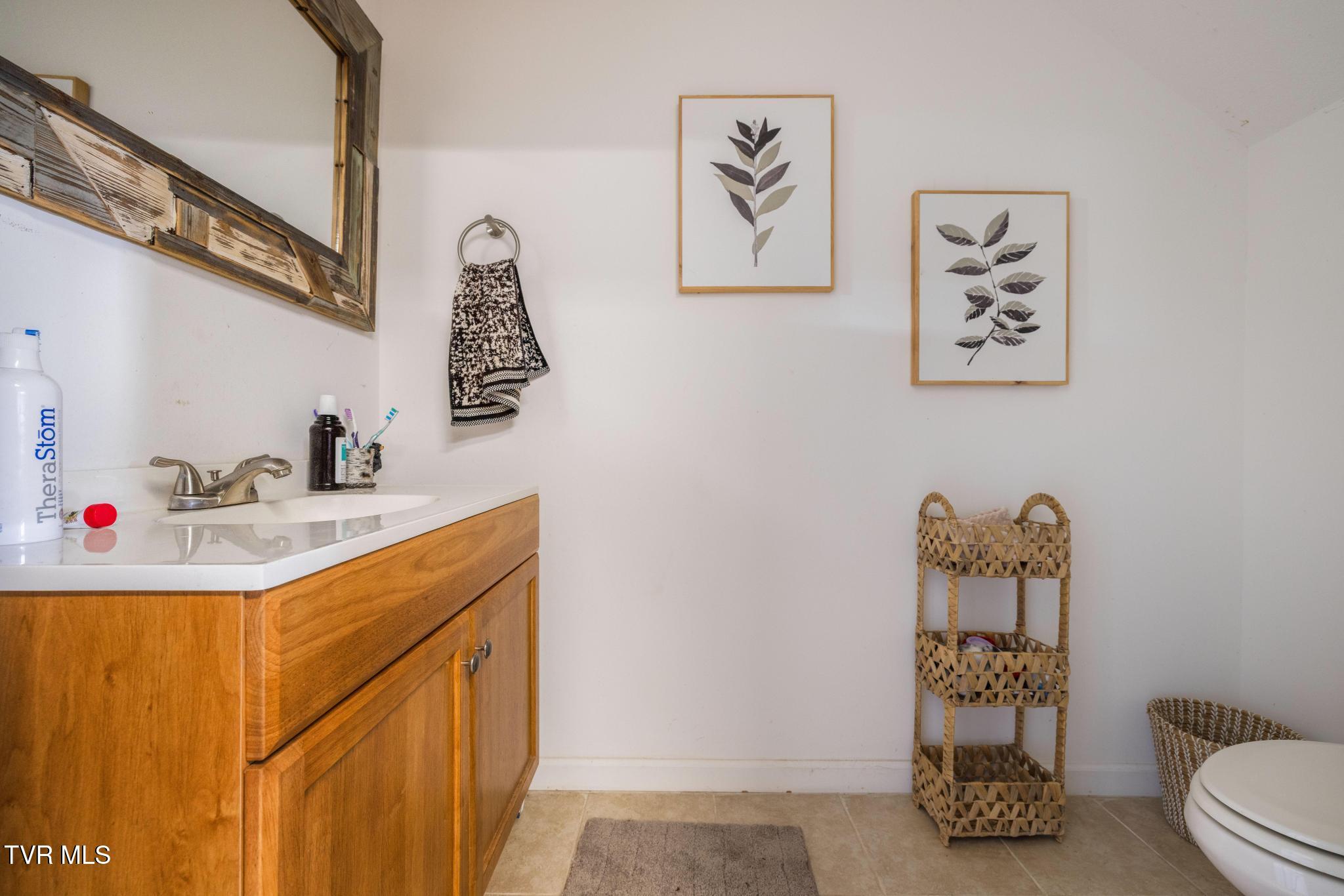 160 Deerchase Lane Chuckey, TN 37641 - Photo 41 of 61 Half bathroom in garage