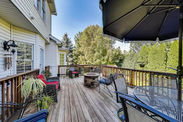 a view of roof deck with furniture
