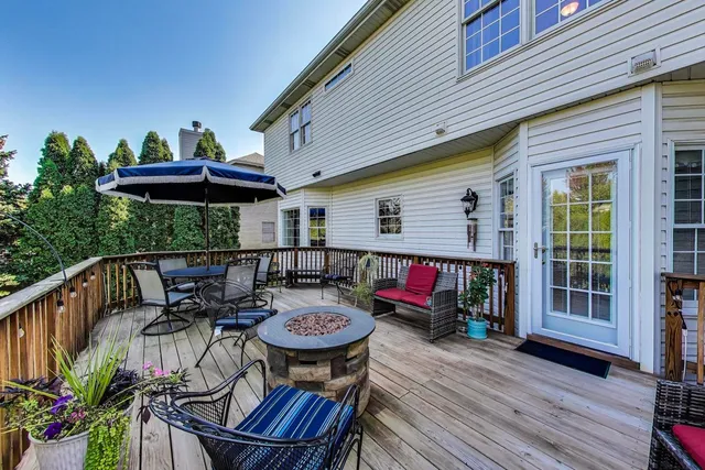 a view of a table and chairs in patio of the house