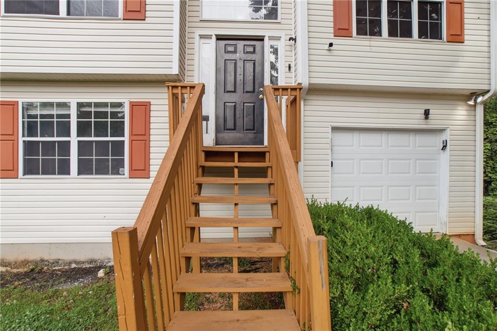 5855 Crescent Ridge Court Lithonia, GA 30058 - Photo 4 of 46 a view of entryway with a front door