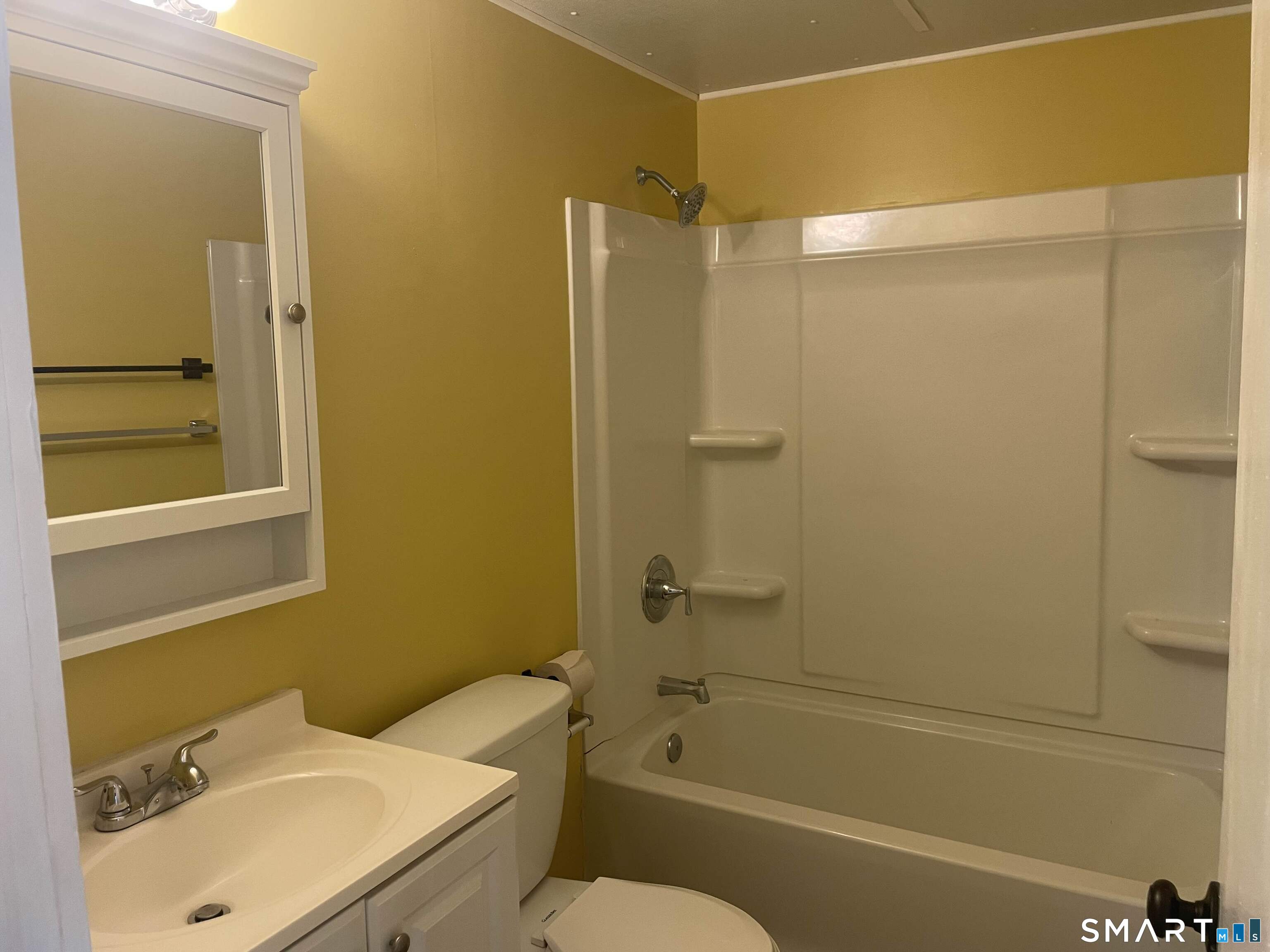 57 North Main Street, Unit D Windsor Locks, CT 06096 - Photo 5 of 7 a bathroom with a sink toilet and shower