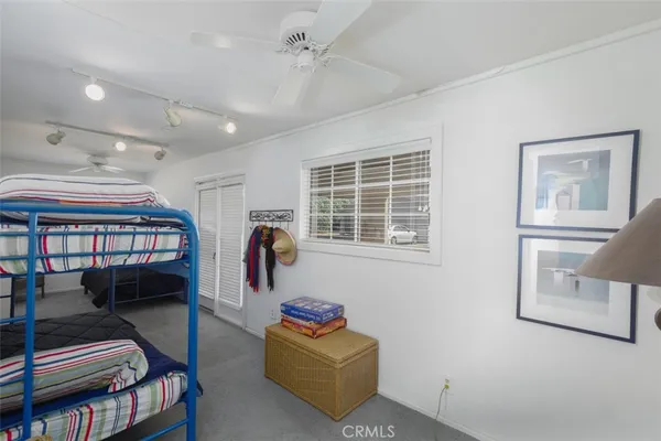 a view of a patio with swimming pool