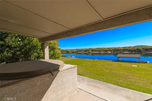 a view of balcony with furniture