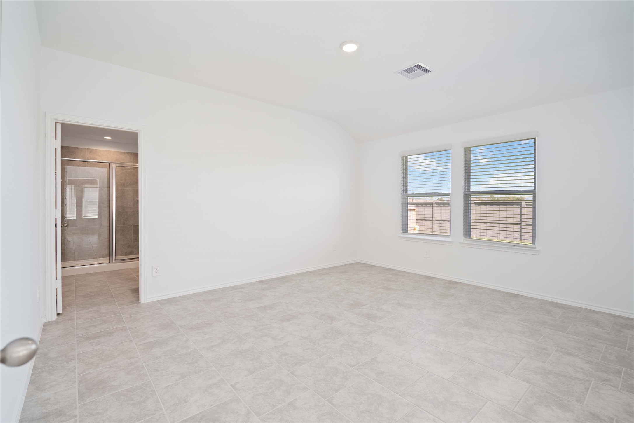7507 Fierce Friesian Lane Rosharon, TX 77583 - Photo 6 of 9 an empty room with windows and closet
