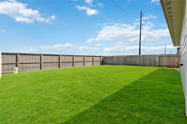 a view of a backyard with a garden
