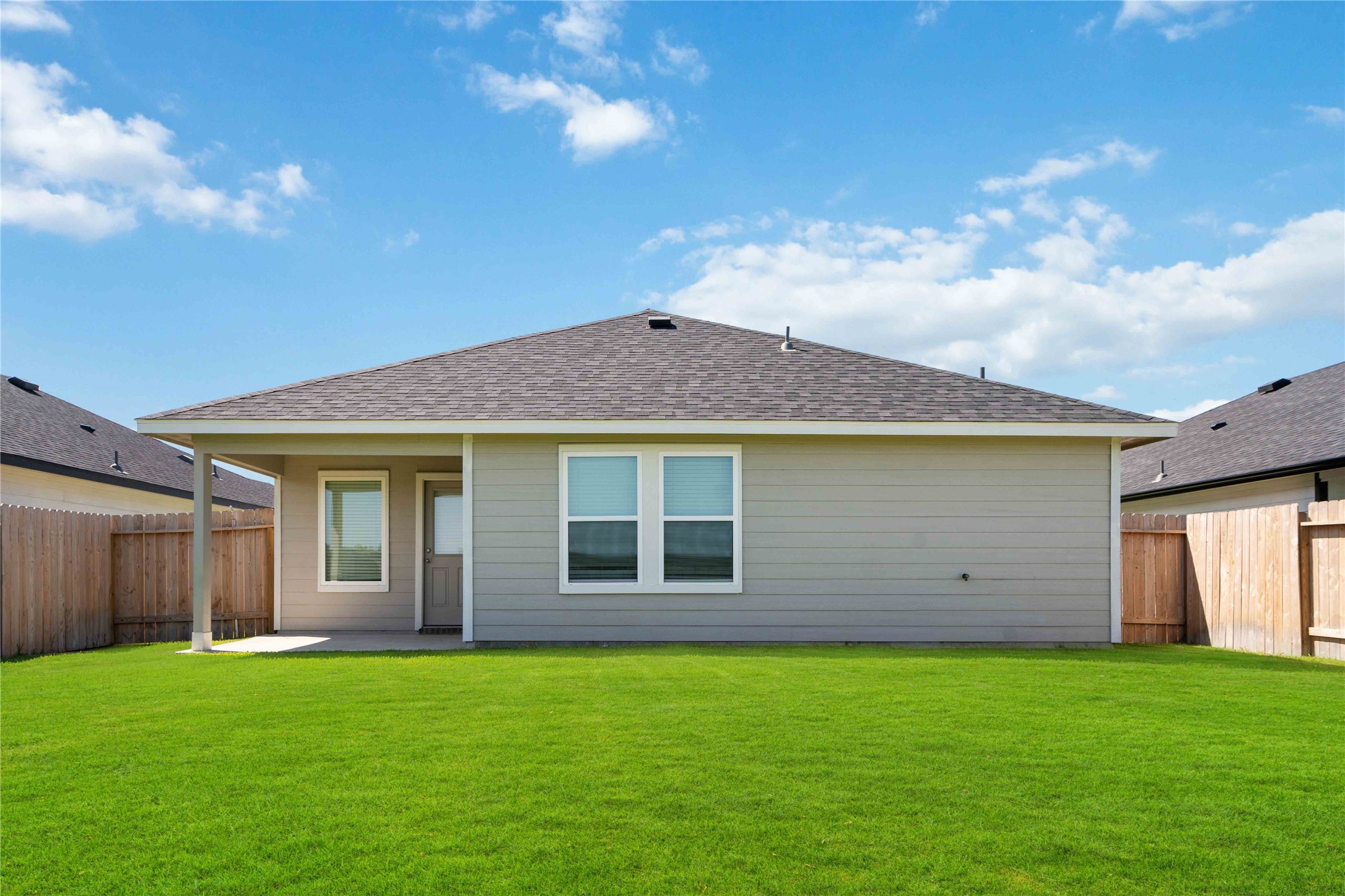 7507 Fierce Friesian Lane Rosharon, TX 77583 - Photo 9 of 9 front view of a house with a garden