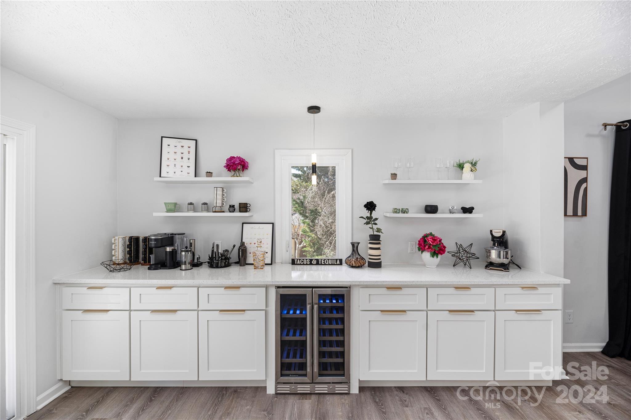 262 Spring Run Road Mooresville, NC 28117 - Photo 14 of 48 a kitchen with white cabinets and appliances