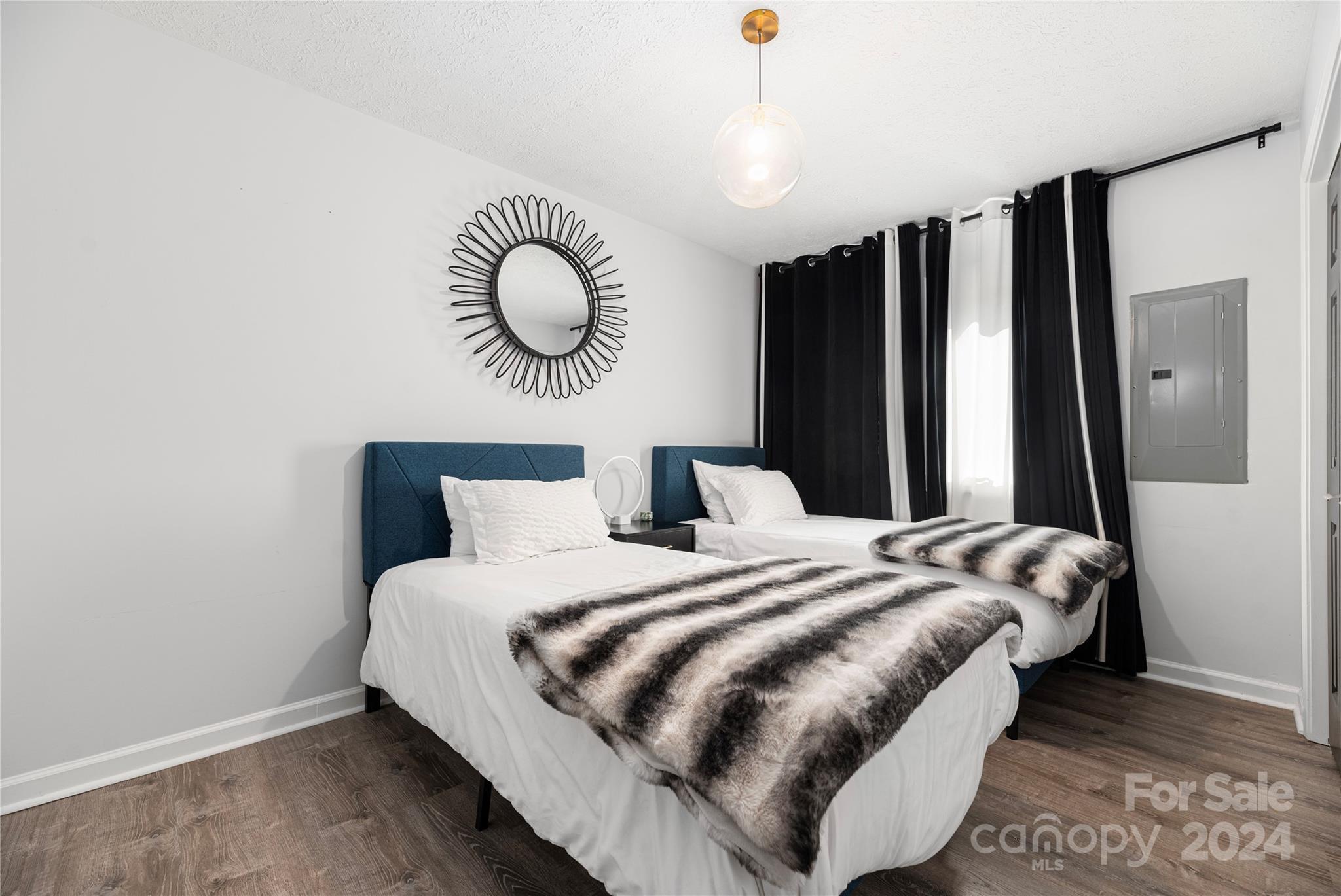 262 Spring Run Road Mooresville, NC 28117 - Photo 17 of 48 a bedroom with bed and a window