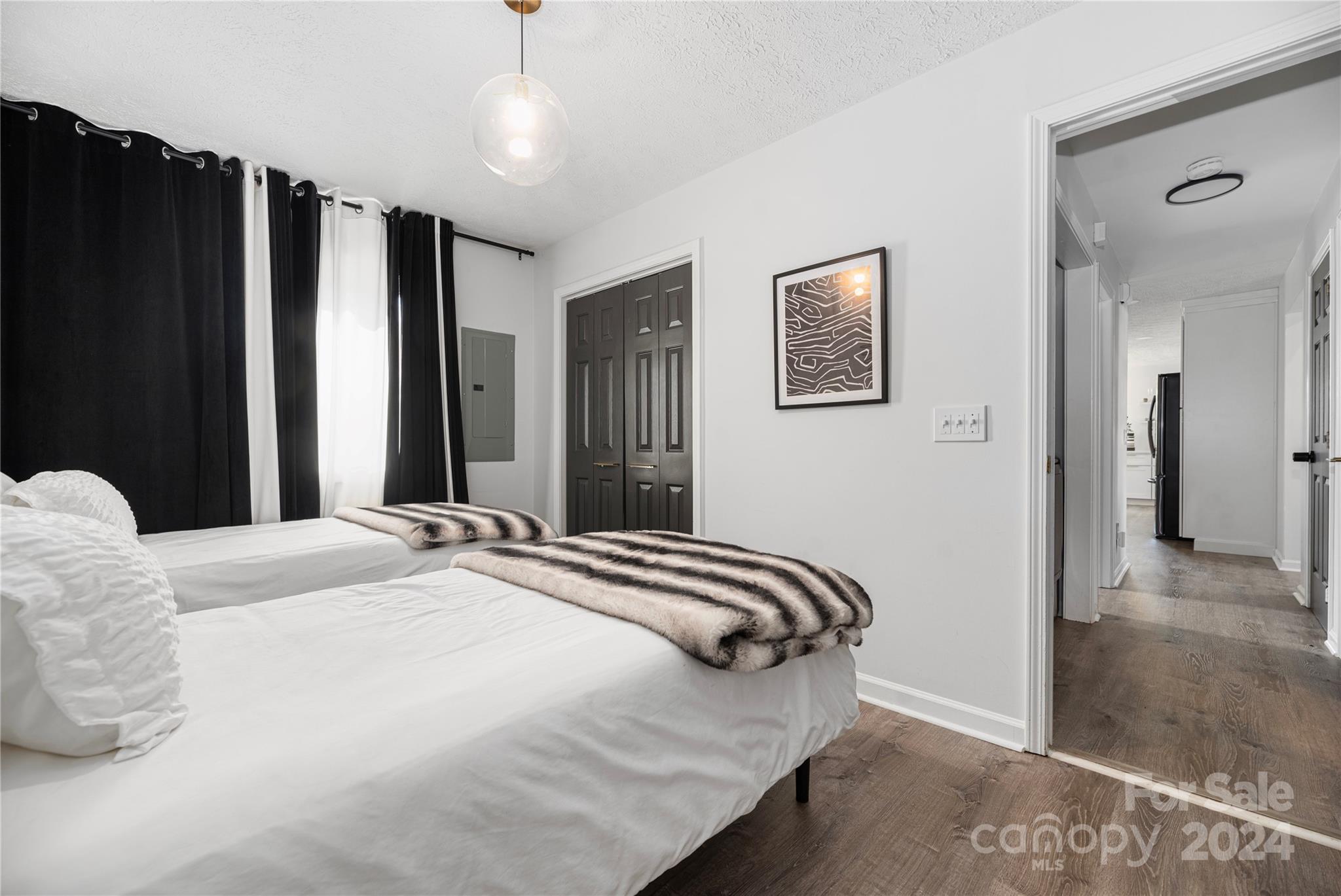 262 Spring Run Road Mooresville, NC 28117 - Photo 18 of 48 a bedroom with a bed and a mirror