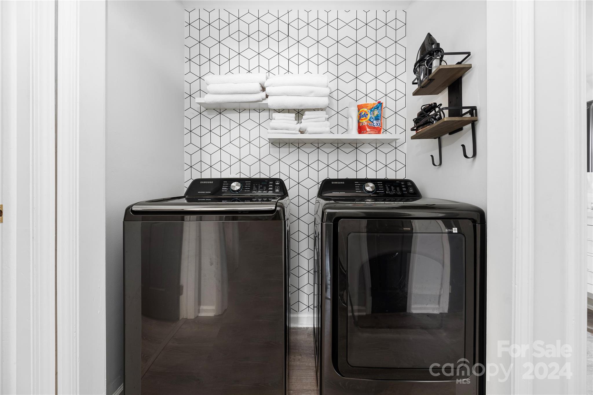 262 Spring Run Road Mooresville, NC 28117 - Photo 23 of 48 a close view of a utility room with dryer and washer