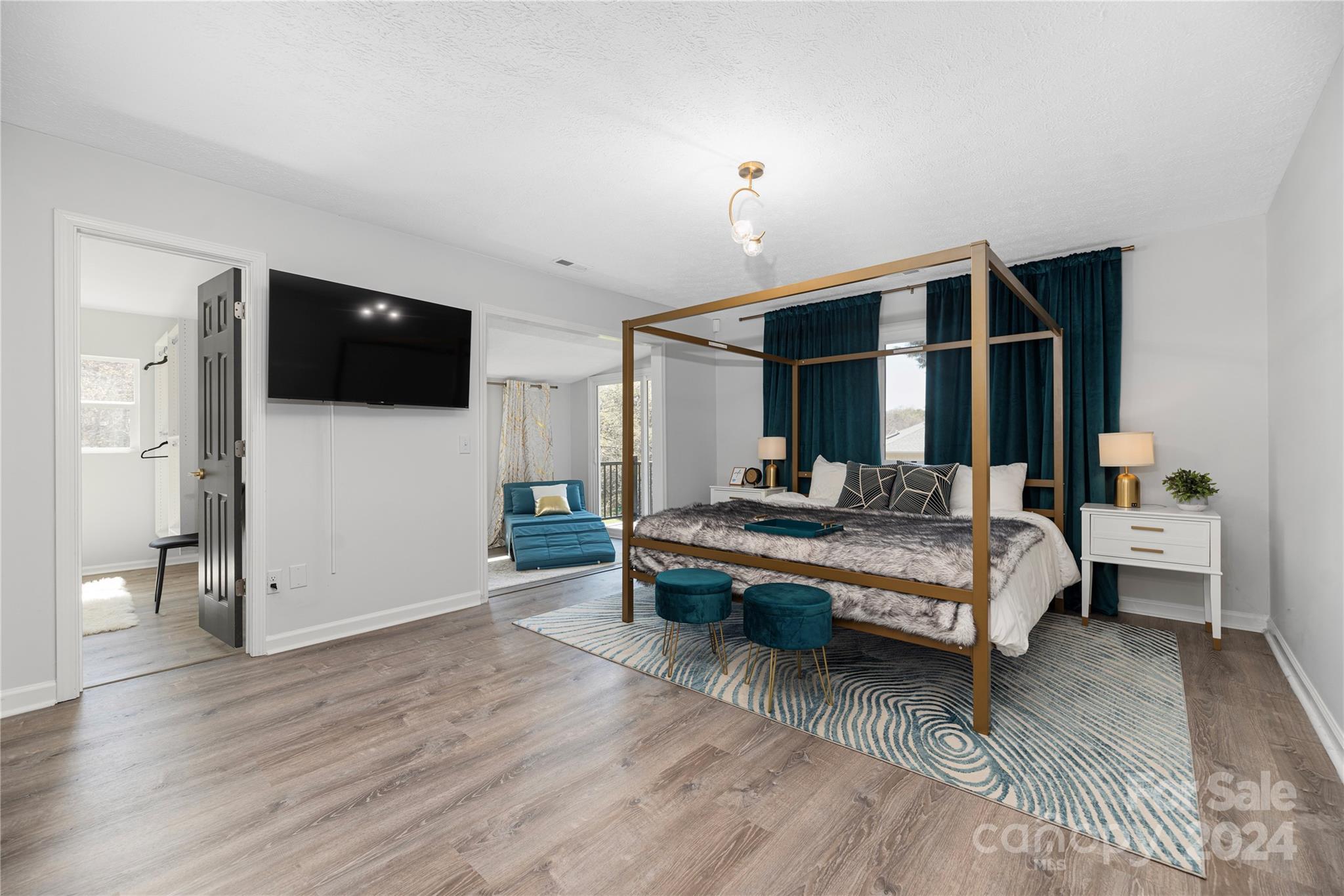 262 Spring Run Road Mooresville, NC 28117 - Photo 24 of 48 a living room with furniture and a flat screen tv