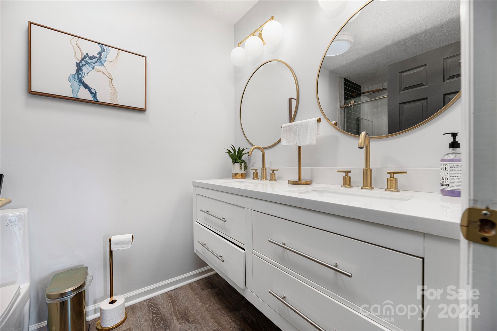 262 Spring Run Road Mooresville, NC 28117 - Photo 29 of 48 a bathroom with a toilet sink and mirror