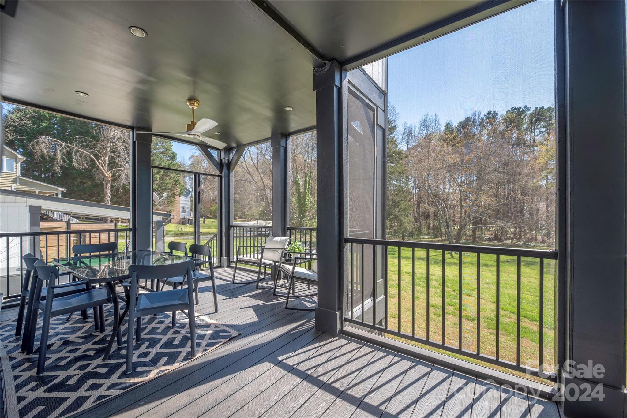 262 Spring Run Road Mooresville, NC 28117 - Photo 38 of 48 a view of a city from a balcony with furniture