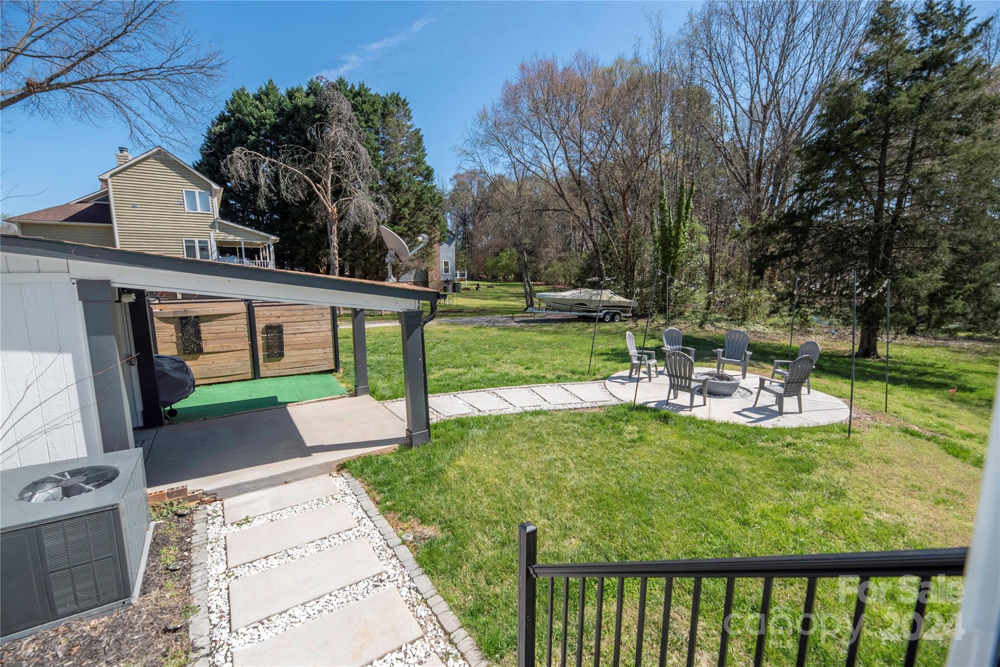 262 Spring Run Road Mooresville, NC 28117 - Photo 40 of 48 a view of a house with backyard and sitting area