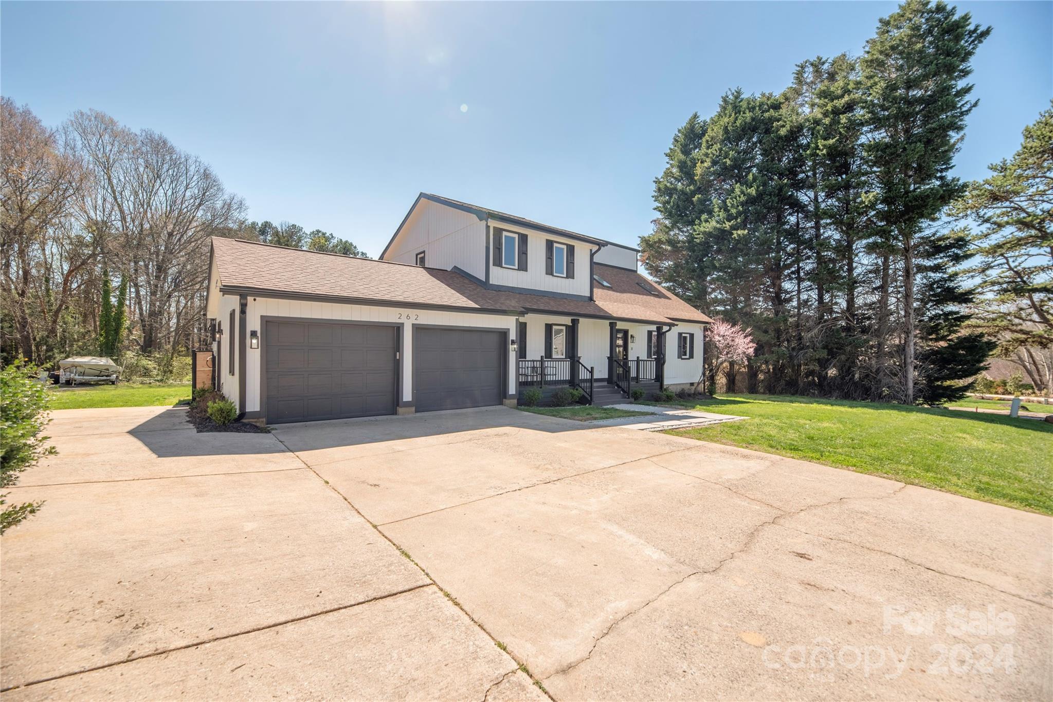 262 Spring Run Road Mooresville, NC 28117 - Photo 4 of 48 a front view of house with yard and green space