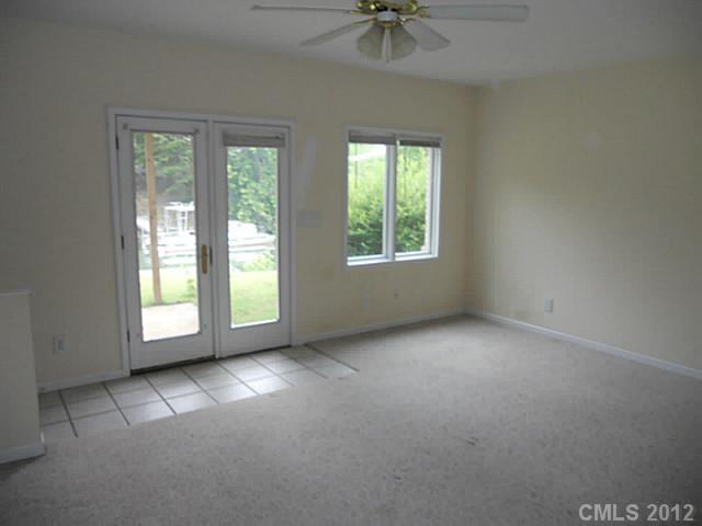 301 Commodore Loop Mooresville, NC 28117 - Photo 12 of 16 an empty room with a window
