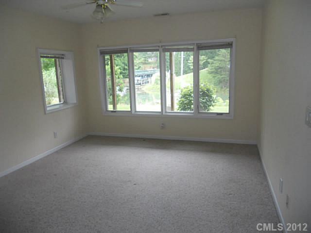 301 Commodore Loop Mooresville, NC 28117 - Photo 14 of 16 an empty room with a window
