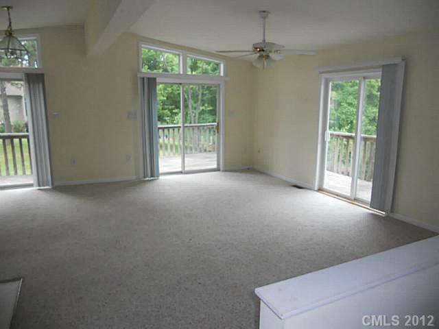 301 Commodore Loop Mooresville, NC 28117 - Photo 5 of 16 an empty room with windows