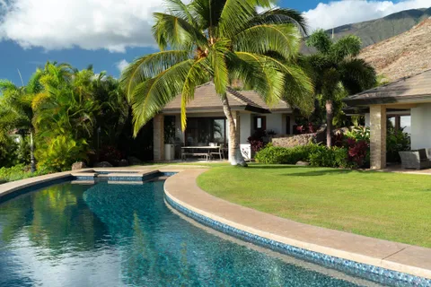 a view of lake with a yard
