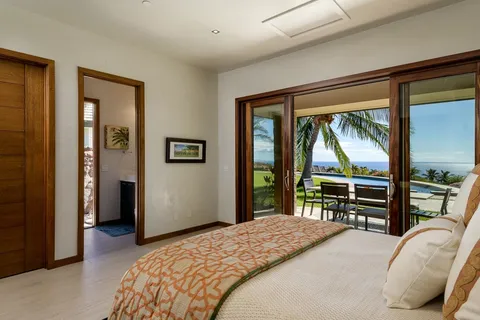 a view of swimming pool and an ocean view