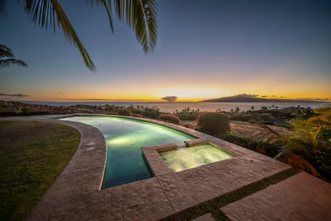 a view of a swimming pool and an ocean view