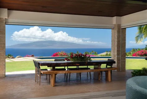 a dining room with furniture and a floor to ceiling window