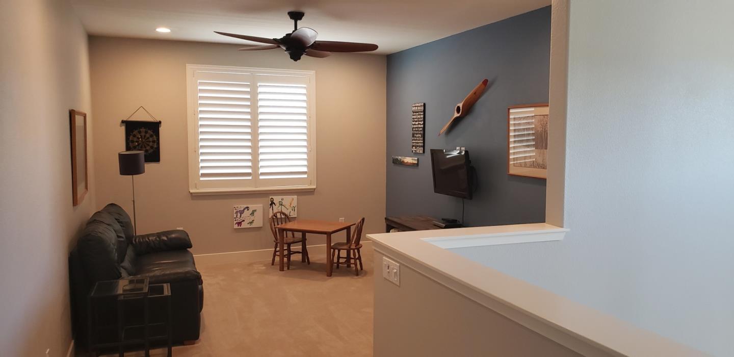 931 Puma Way Gilroy, CA 95020 - Photo 22 of 27 a living room with furniture and a window