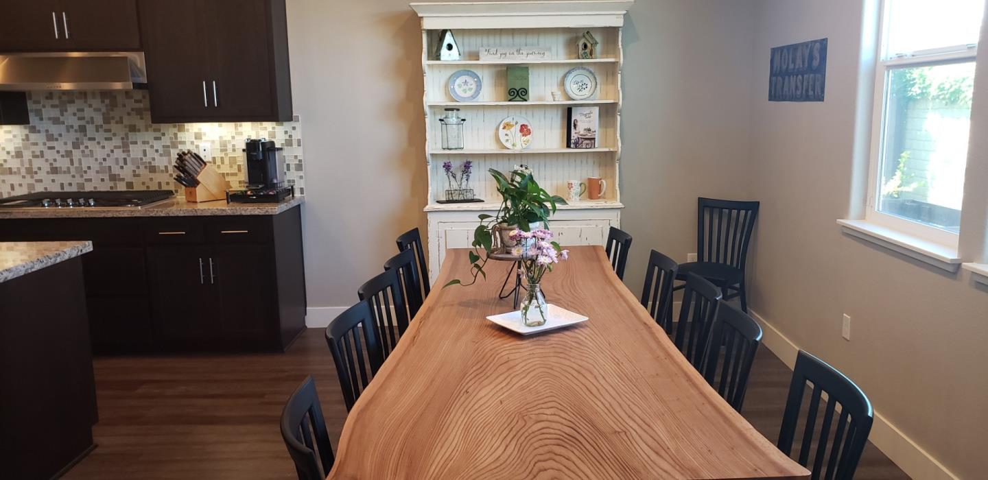 931 Puma Way Gilroy, CA 95020 - Photo 8 of 27 a dining room with furniture and wooden floor