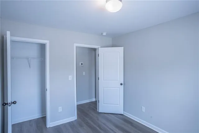 a view of a livingroom with wooden floor