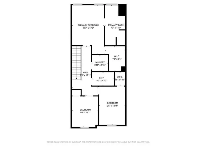 a picture of a bench in front of a wall