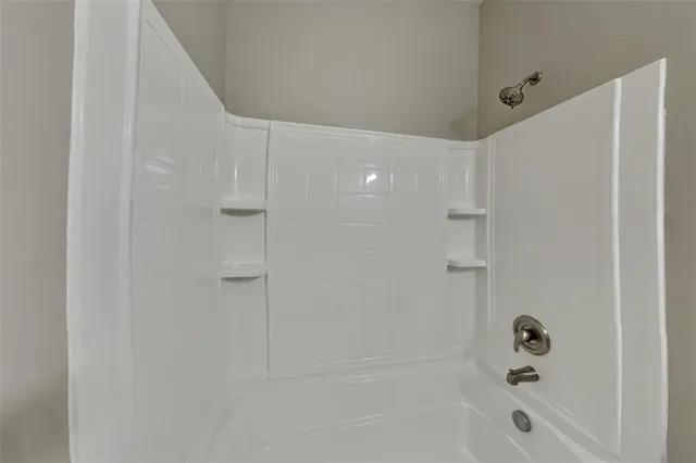a bathroom with a bathtub