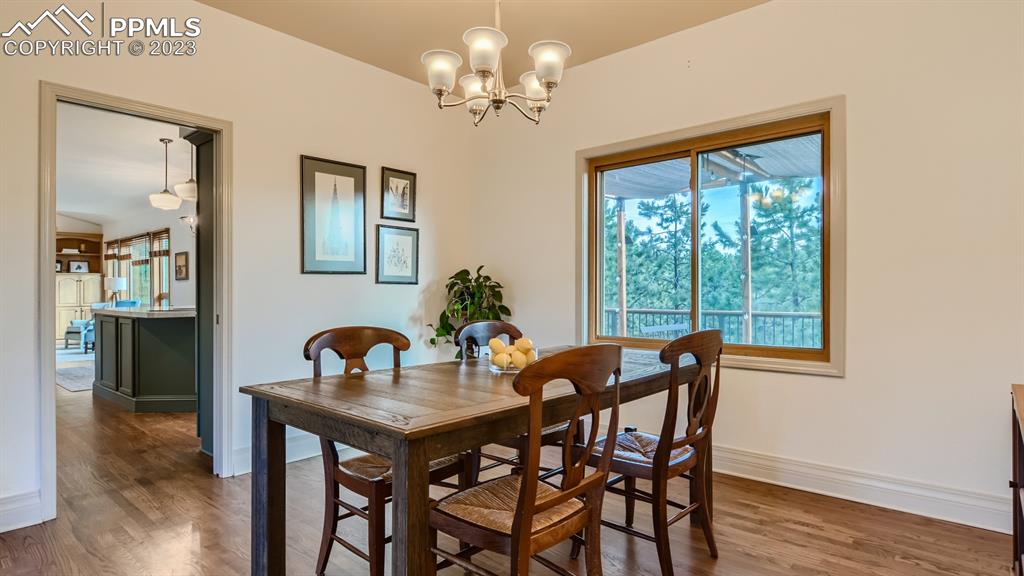 65 Pontiac Loop Monument, CO 80132 - Photo 13 of 49 a dining room with furniture and window