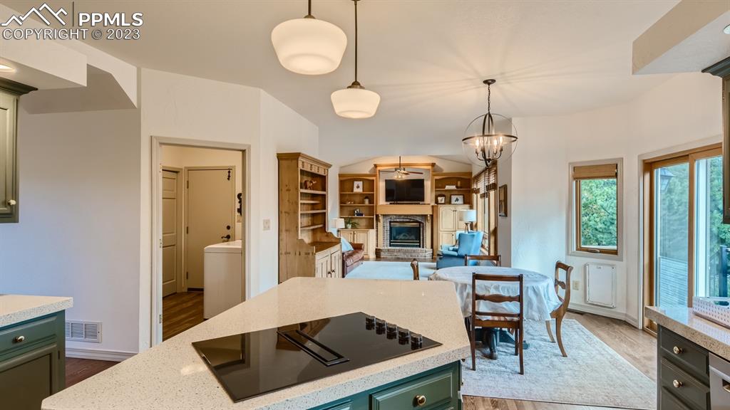 65 Pontiac Loop Monument, CO 80132 - Photo 18 of 49 a view of a dining room with furniture window and outside view