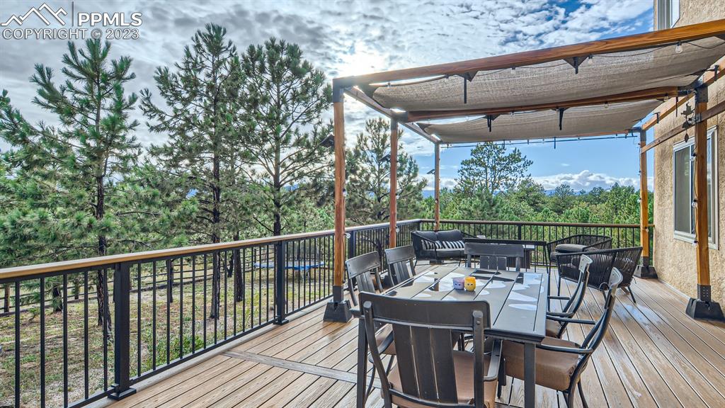 65 Pontiac Loop Monument, CO 80132 - Photo 20 of 49 a view of balcony with furniture and deck