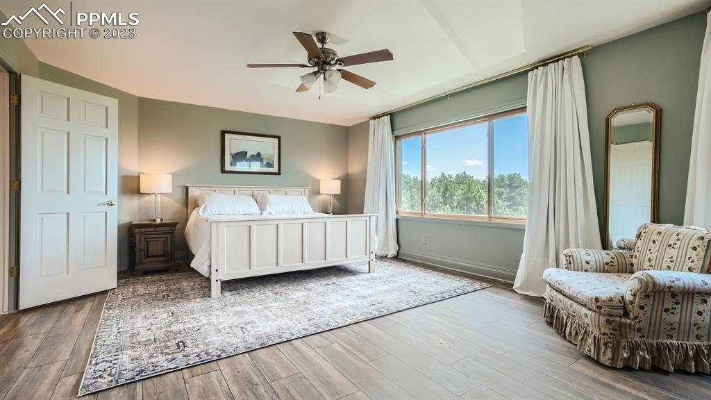 65 Pontiac Loop Monument, CO 80132 - Photo 28 of 49 a bedroom with a bed and a window