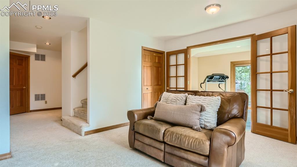 65 Pontiac Loop Monument, CO 80132 - Photo 41 of 49 a living room with furniture and a large window