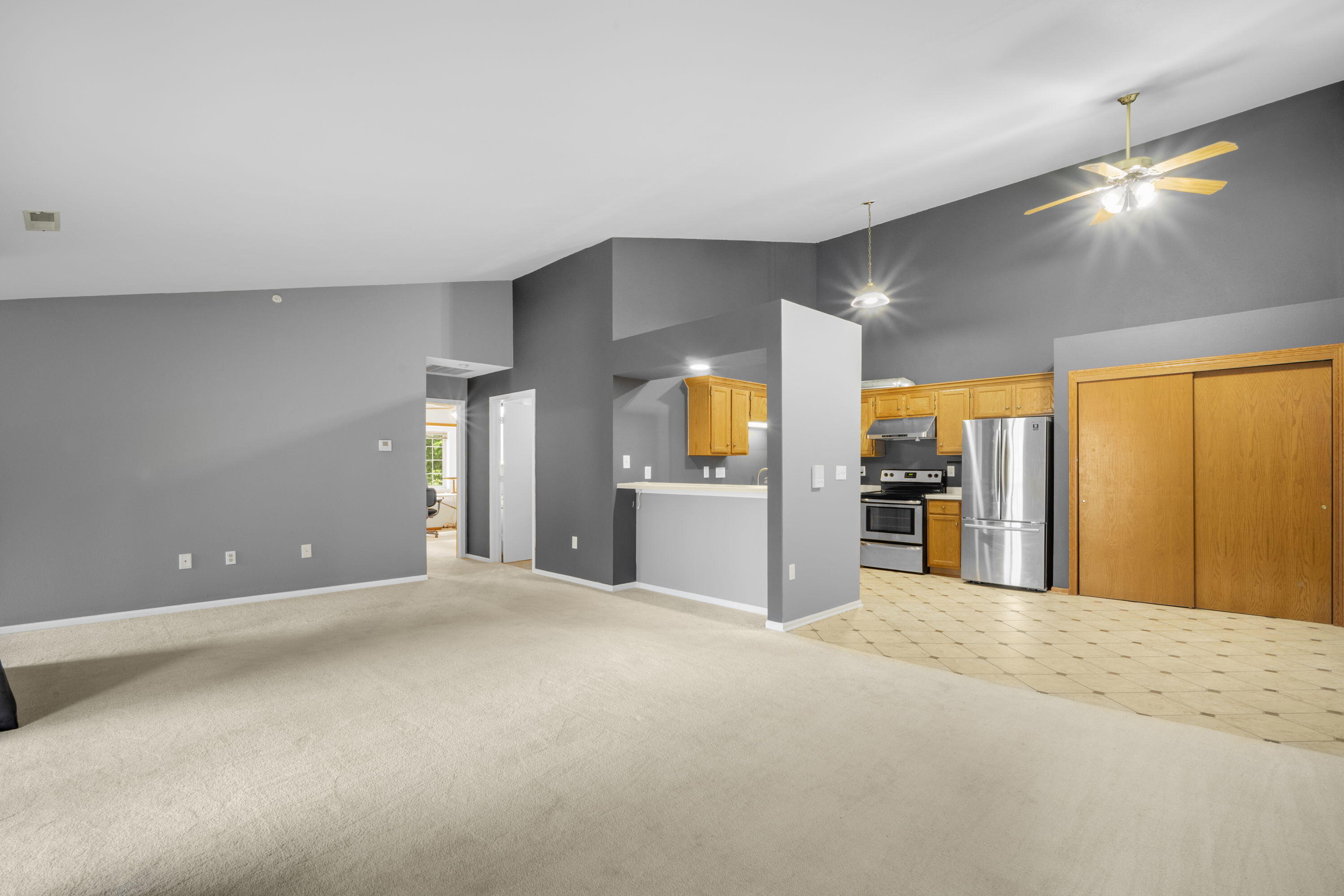 9322 West Loomis Road, Unit 5 Franklin, WI 53132 - Photo 6 of 19 Living Room / Kitchen